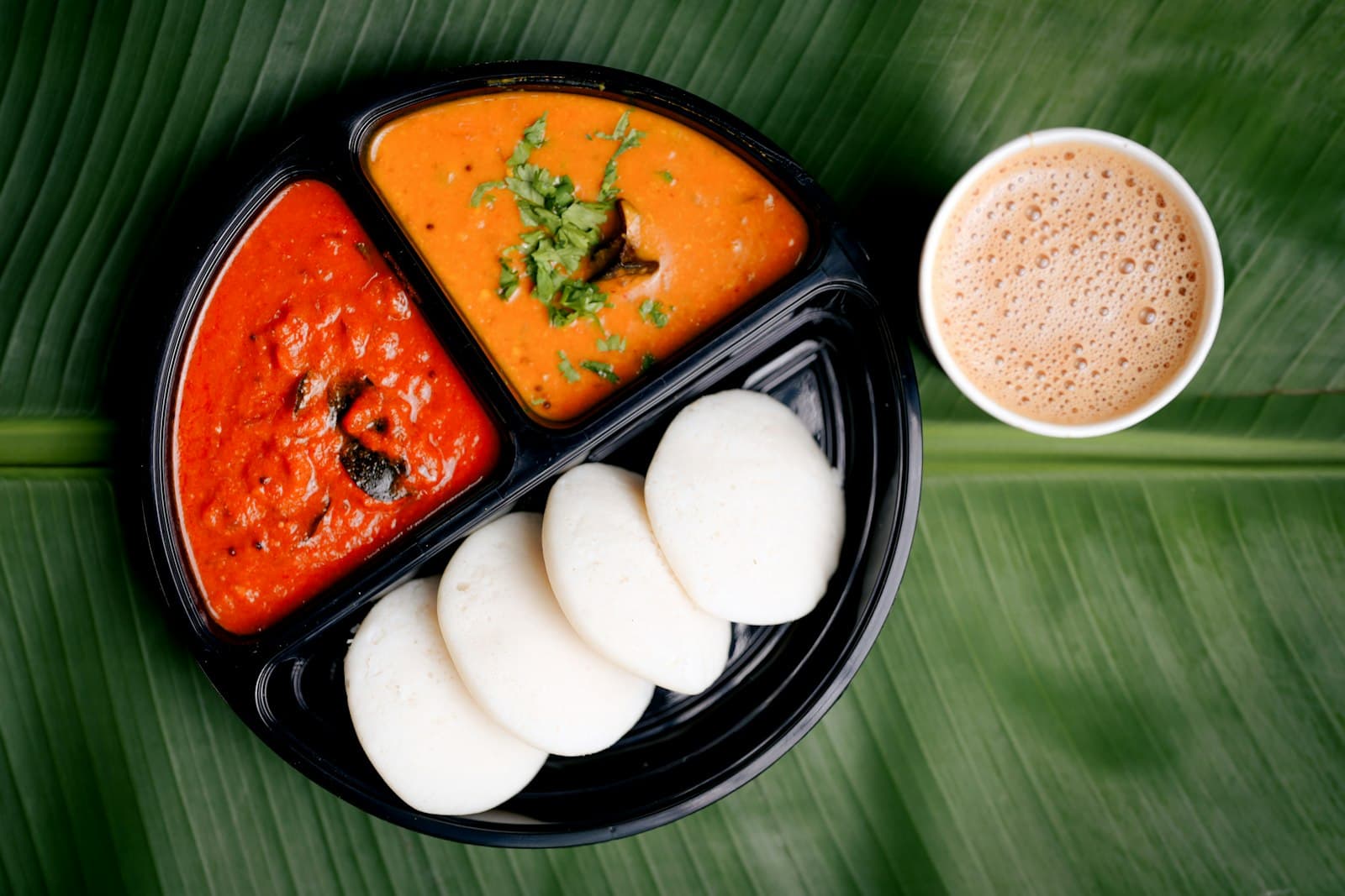 Idli with sambhar, chutney and a cup of filter coffee